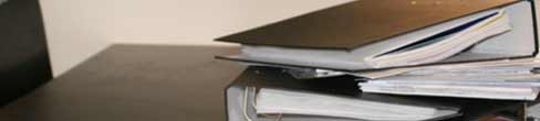 Stack of folders on a desk